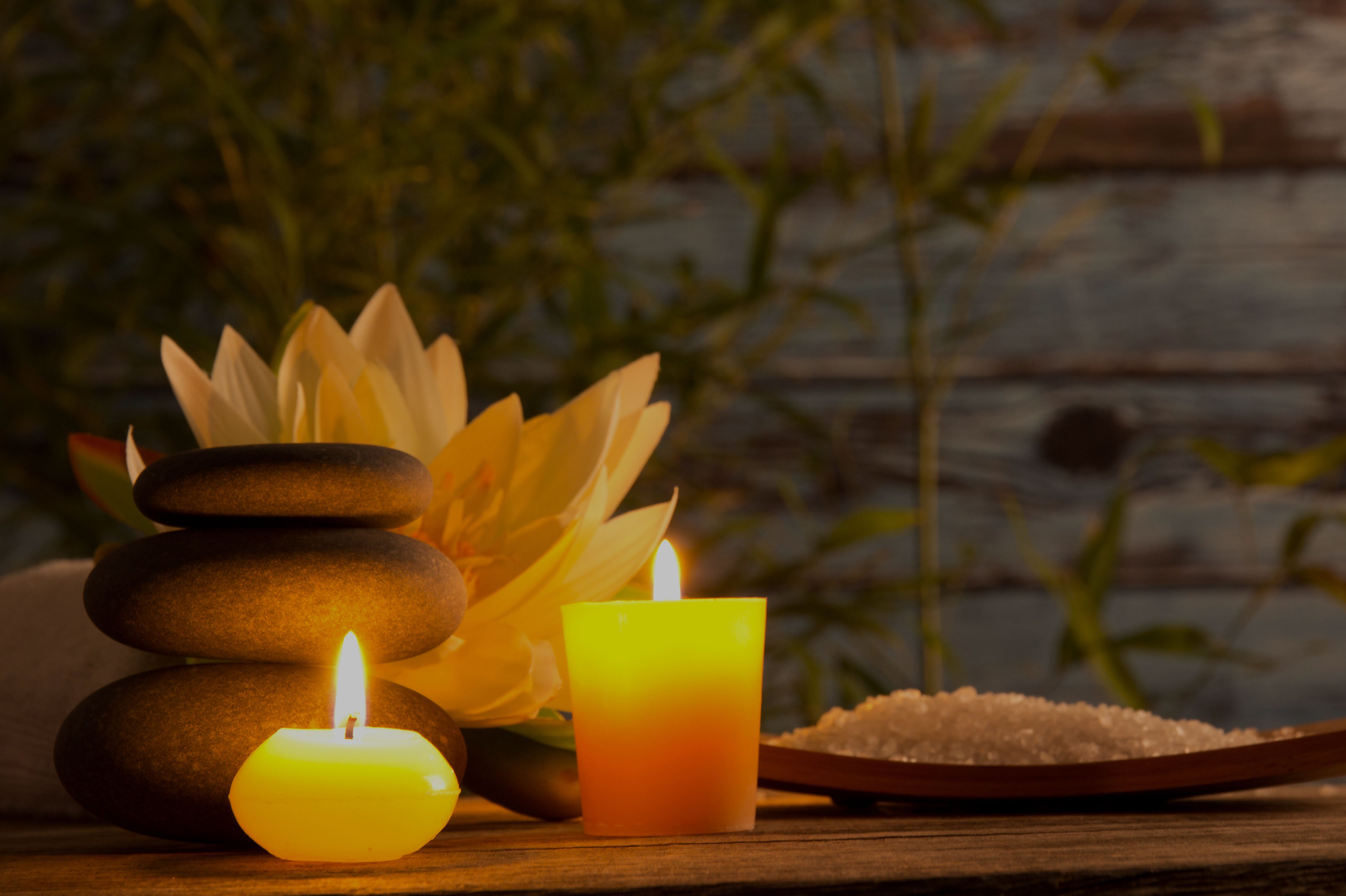 candles, stones, flower, and salts